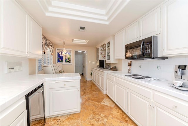 662 Via Zapata, Riverside, CA 92507 - kitchen featuring black microwave, tile counters, white electric cooktop, and wine cooler