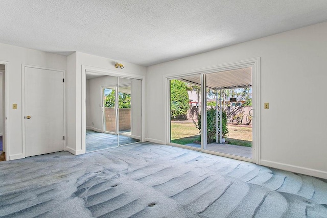 14202 Del Amo Ave, Tustin, CA 92780 - spare room with carpet flooring and a textured ceiling