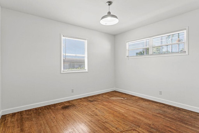 14202 Del Amo Ave, Tustin, CA 92780 - unfurnished room with baseboards and hardwood / wood-style flooring