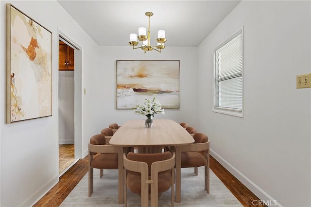 14202 Del Amo Ave, Tustin, CA 92780 - dining space featuring a chandelier and wood finished floors