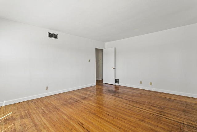 14202 Del Amo Ave, Tustin, CA 92780 - unfurnished room featuring wood finished floors