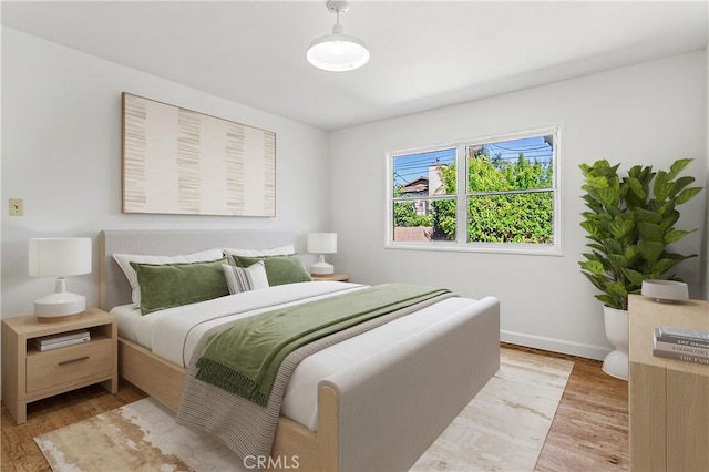 14202 Del Amo Ave, Tustin, CA 92780 - bedroom featuring light wood-style flooring and baseboards