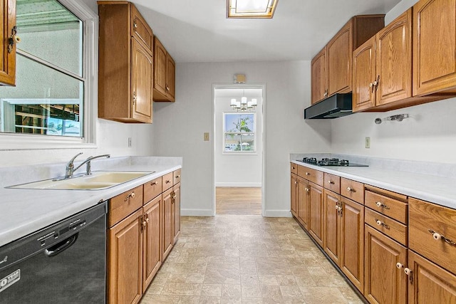 14202 Del Amo Ave, Tustin, CA 92780 - kitchen featuring dishwasher, brown cabinetry, and light countertops