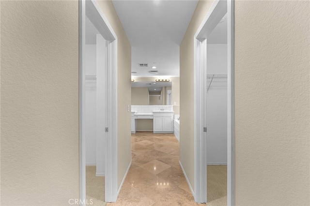 1581 Margit St, Redlands, CA 92374 - hallway with a textured wall and recessed lighting