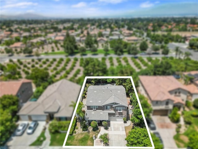 1581 Margit St, Redlands, CA 92374 - aerial perspective of suburban area featuring property parcel outlined