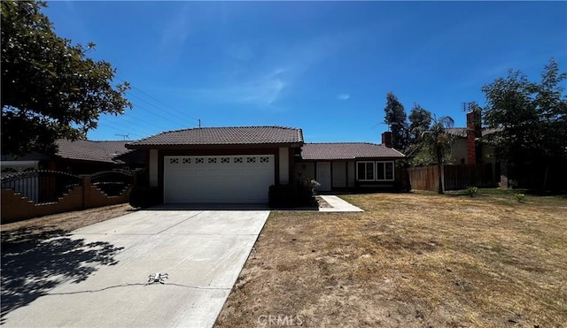 4214 Harrison St, Riverside, CA 92503 - single story home featuring a tiled roof, an attached garage, concrete driveway, a chimney, and stucco siding