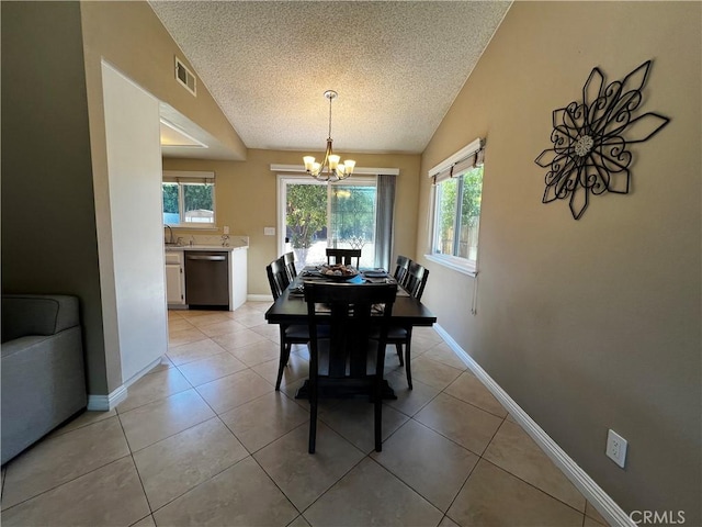 4214 Harrison St, Riverside, CA 92503 - dining area with a textured ceiling, a chandelier, healthy amount of natural light, light tile patterned floors, and vaulted ceiling