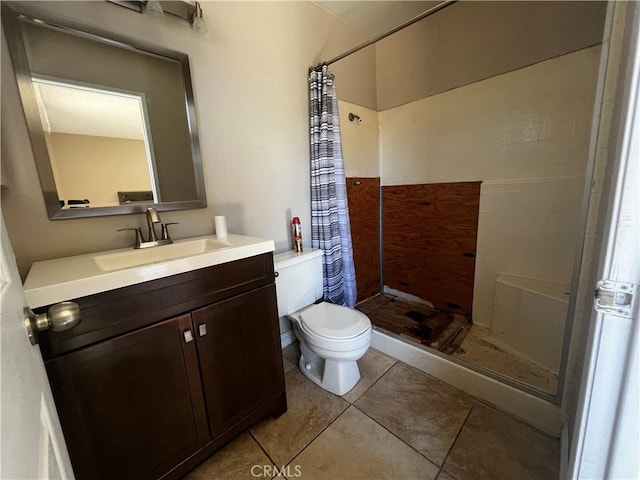 4214 Harrison St, Riverside, CA 92503 - full bath featuring tiled shower, vanity, and tile patterned flooring