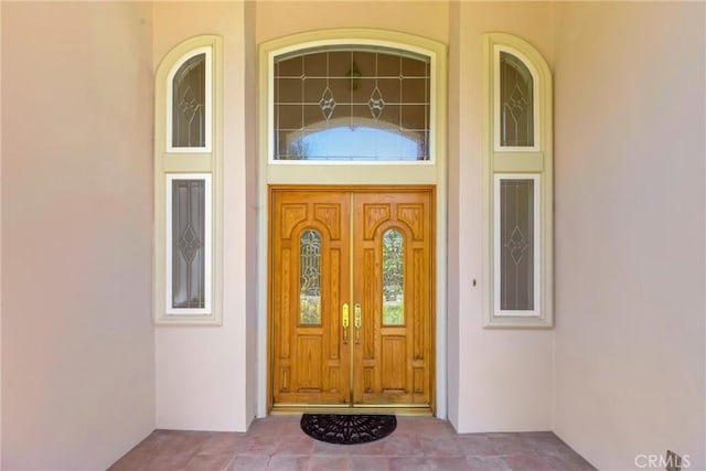 134 E Las Flores Ave, Arcadia, CA 91006 - doorway to property featuring stucco siding