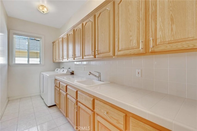 134 E Las Flores Ave, Arcadia, CA 91006 - washroom with cabinet space, washer and clothes dryer, and light tile patterned floors