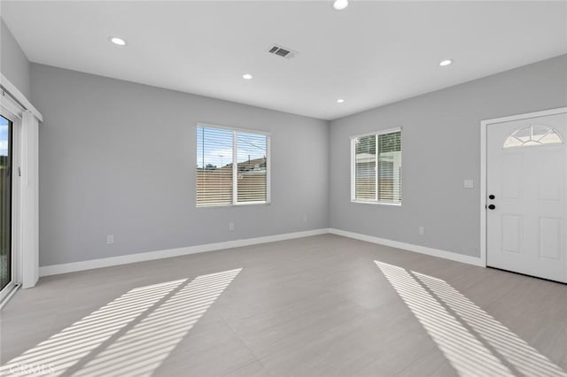 12108 Dunrobin Ave, Downey, CA 90242 - foyer with recessed lighting and light wood finished floors