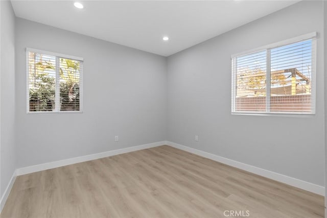 12108 Dunrobin Ave, Downey, CA 90242 - unfurnished room featuring light wood-style flooring and recessed lighting