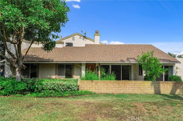 19950 Esquiline Ave, Walnut, CA 91789 - rear view of property featuring a lawn, a chimney, and roof with shingles
