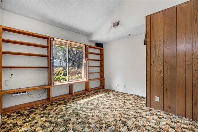 19950 Esquiline Ave, Walnut, CA 91789 - carpeted empty room featuring lofted ceiling and a textured ceiling