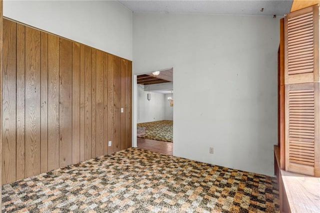 19950 Esquiline Ave, Walnut, CA 91789 - unfurnished bedroom with wood walls and carpet floors