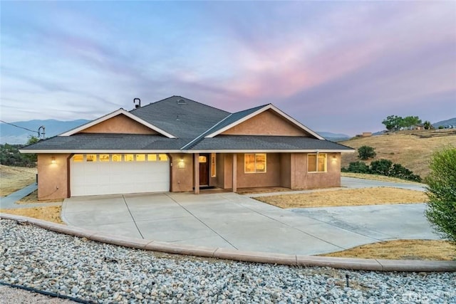 23309 Tak Ct, Tehachapi, CA 93561 - single story home with driveway, a garage, roof with shingles, a porch, and stucco siding