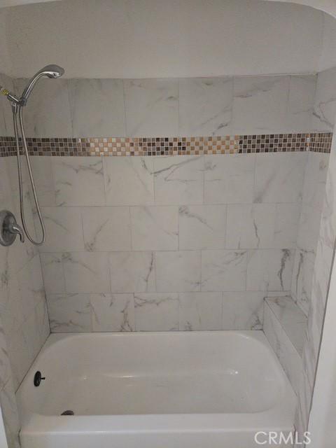 2467 California St, Huntington Park, CA 90255 - full bath featuring shower / tub combination