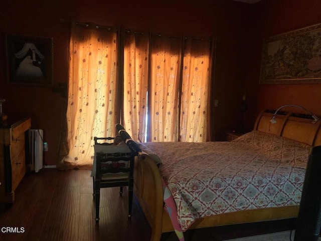 20151 Serrano Rd, Apple Valley, CA 92307 - bedroom with radiator and wood finished floors