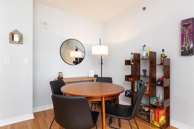 425 W Beech St Unit 613, San Diego, CA 92101 - dining space featuring light wood-style flooring and baseboards