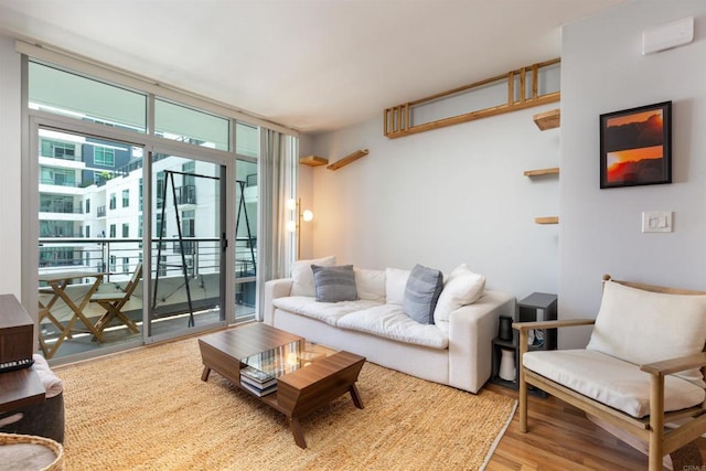 425 W Beech St Unit 613, San Diego, CA 92101 - living room with wood finished floors and floor to ceiling windows