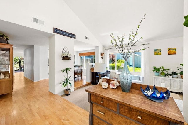 3432 Mount Ariane Dr, San Diego, CA 92111 - dining area with plenty of natural light, light wood-type flooring, and high vaulted ceiling