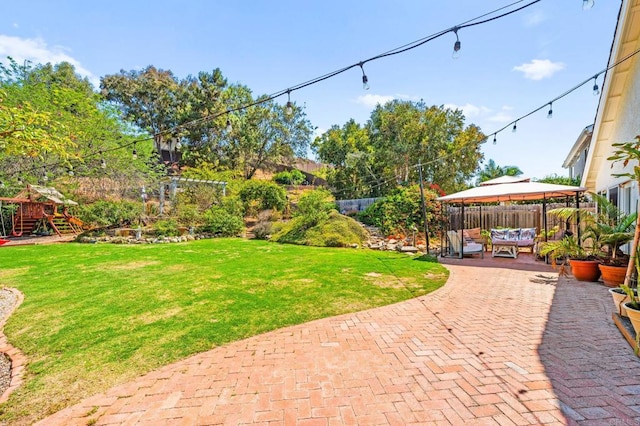 3432 Mount Ariane Dr, San Diego, CA 92111 - fenced backyard with a gazebo, a patio area, a playground, and an outdoor hangout area
