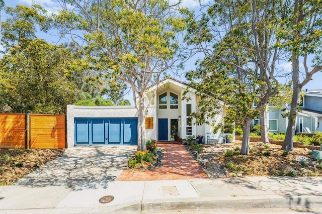3432 Mount Ariane Dr, San Diego, CA 92111 - mid-century home with stucco siding and concrete driveway