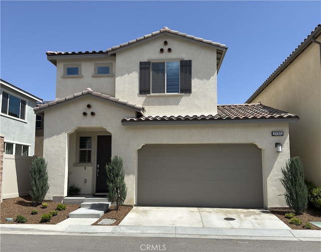 29392 Tourmaline Way, Winchester, CA 92596 - mediterranean / spanish home with a tiled roof, stucco siding, concrete driveway, and a garage