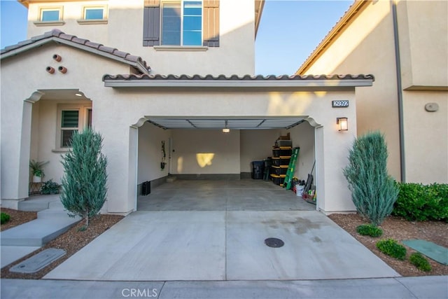 29392 Tourmaline Way, Winchester, CA 92596 - view of front of property with driveway and stucco siding