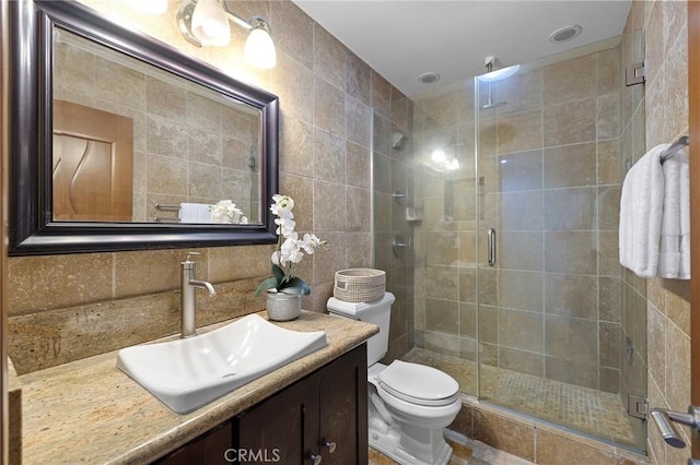 22824 Hilton Head Dr Unit 87, Diamond Bar, CA 91765 - full bath featuring vanity, a shower stall, tile walls, and decorative backsplash