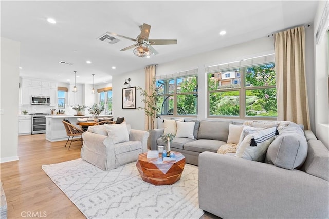 38 Marisol St, Rancho Mission Viejo, CA 92694 - living room featuring light wood finished floors, a ceiling fan, and recessed lighting