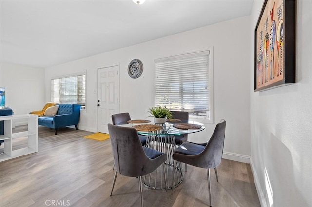 8626 Stark St, Riverside, CA 92504 - dining area featuring wood finished floors and baseboards