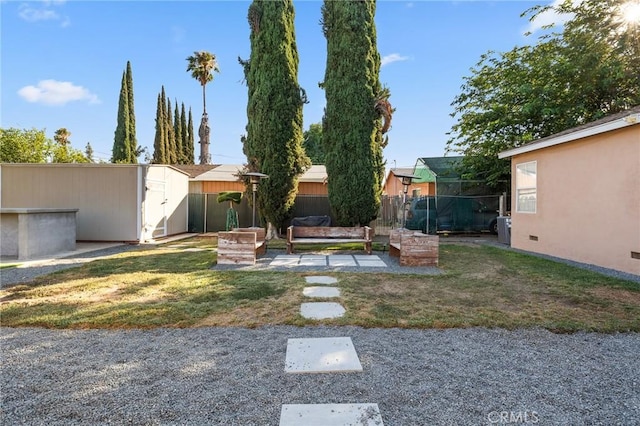 8626 Stark St, Riverside, CA 92504 - view of yard with a storage shed and a garden