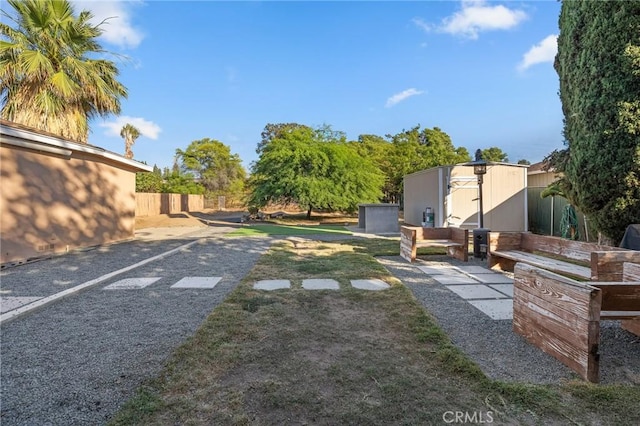 8626 Stark St, Riverside, CA 92504 - view of yard featuring a storage unit