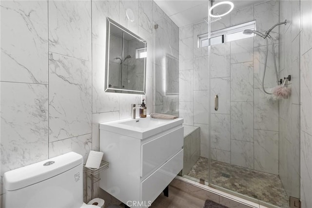 8626 Stark St, Riverside, CA 92504 - bathroom featuring a shower stall, vanity, and tile walls