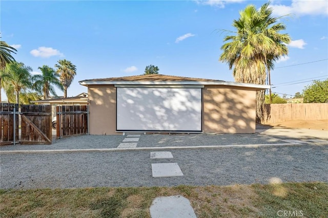 8626 Stark St, Riverside, CA 92504 - view of front of property featuring stucco siding and a gate