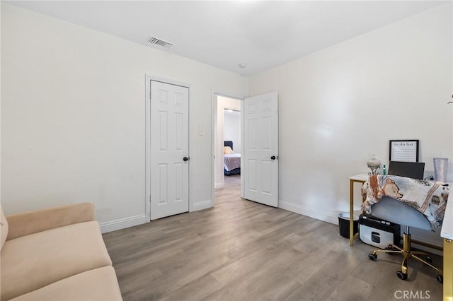 8626 Stark St, Riverside, CA 92504 - home office featuring wood finished floors