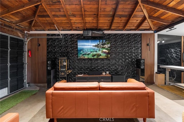 8626 Stark St, Riverside, CA 92504 - home theater room featuring vaulted ceiling, concrete flooring, and wood ceiling
