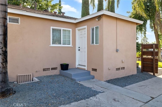 8626 Stark St, Riverside, CA 92504 - entrance to property with crawl space and stucco siding