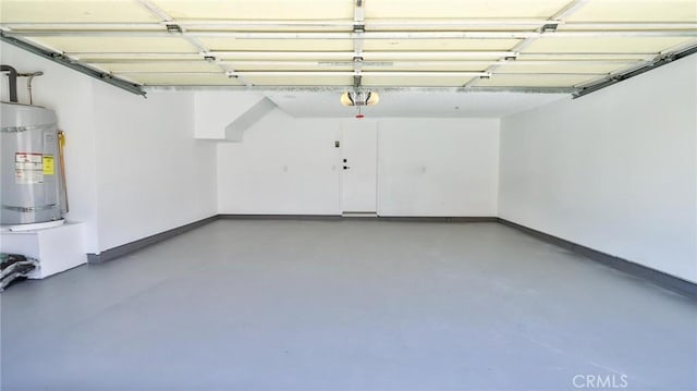 8810 Hewitt Pl Unit 2, Garden Grove, CA 92844 - garage featuring water heater and a garage door opener