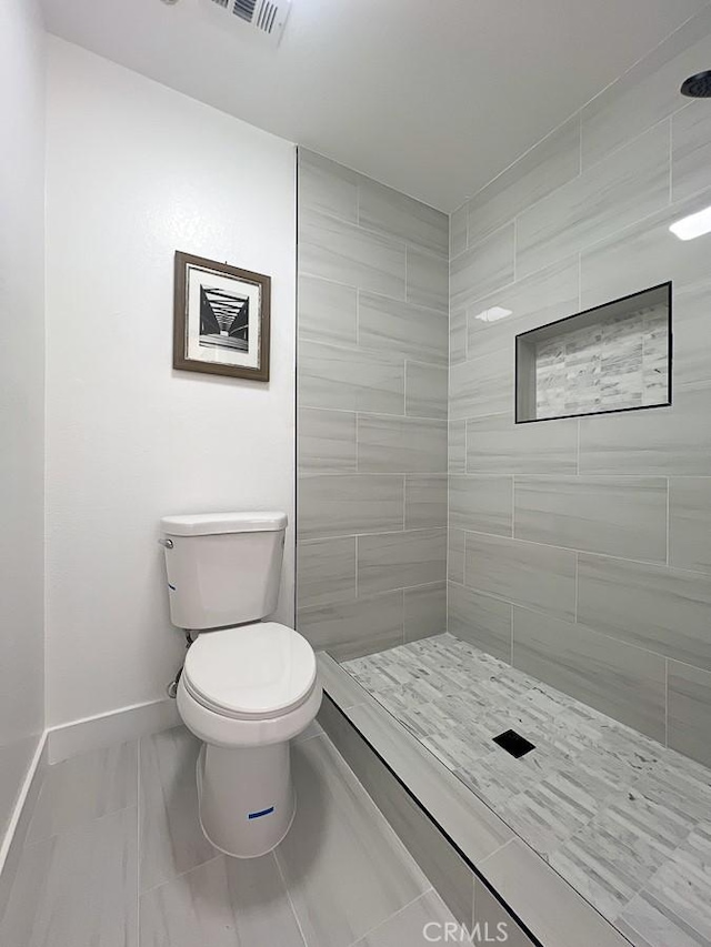 8810 Hewitt Pl Unit 2, Garden Grove, CA 92844 - bathroom with tiled shower and marble finish flooring