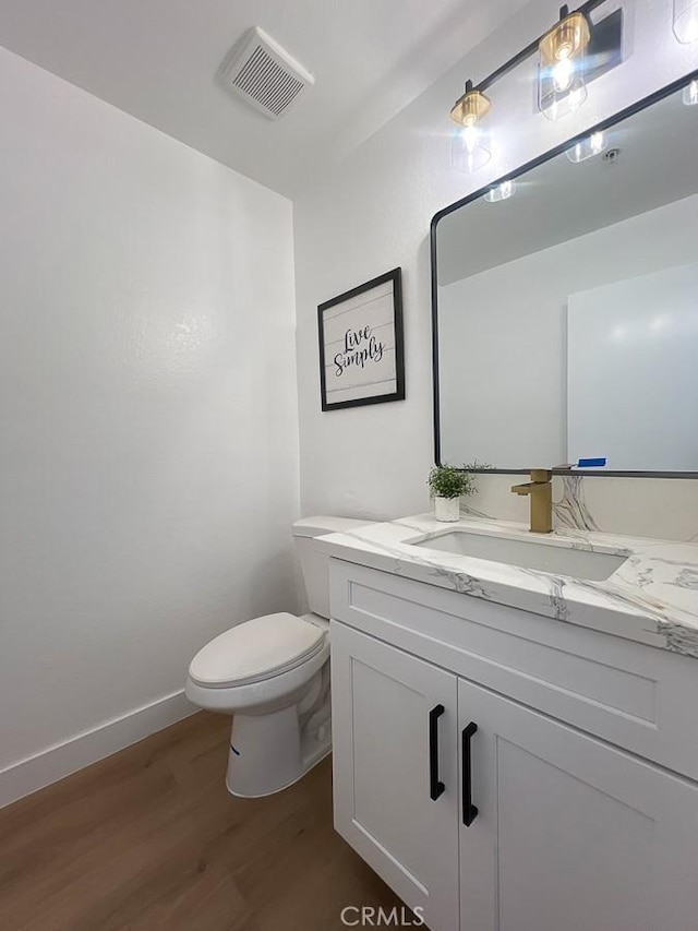 8810 Hewitt Pl Unit 2, Garden Grove, CA 92844 - bathroom featuring wood finished floors and vanity