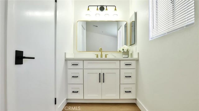 8810 Hewitt Pl Unit 2, Garden Grove, CA 92844 - bathroom with vanity and wood finished floors