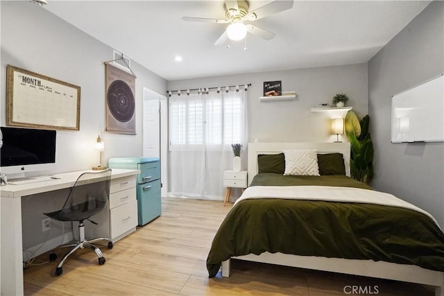 18230 Oxnard St Unit 110, Tarzana, CA 91356 - bedroom with light wood finished floors, an office area, and a ceiling fan
