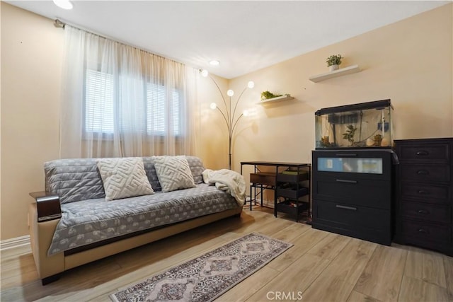 18230 Oxnard St Unit 110, Tarzana, CA 91356 - living room featuring light wood-type flooring and recessed lighting