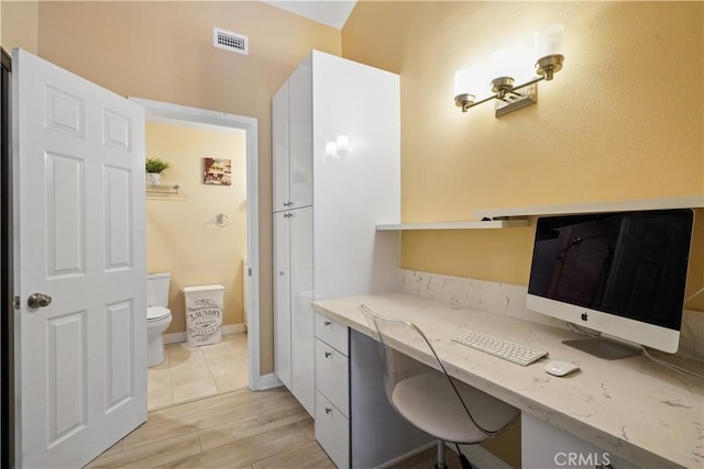 18230 Oxnard St Unit 110, Tarzana, CA 91356 - office with built in study area and light wood-style flooring