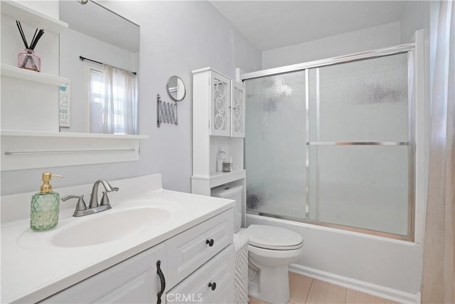 18230 Oxnard St Unit 110, Tarzana, CA 91356 - bathroom featuring vanity and bath / shower combo with glass door