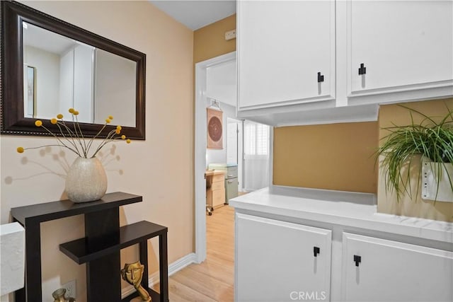 18230 Oxnard St Unit 110, Tarzana, CA 91356 - hall featuring light wood finished floors and baseboards