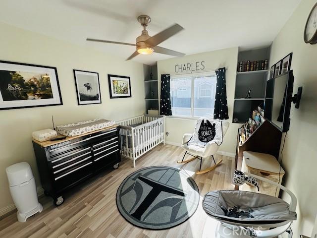 6080 Cape Cod Ln Unit 54, Yorba Linda, CA 92887 - living area with wood finished floors and a ceiling fan