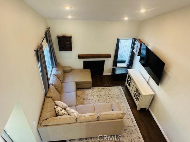 6080 Cape Cod Ln Unit 54, Yorba Linda, CA 92887 - living area featuring dark wood-type flooring and recessed lighting